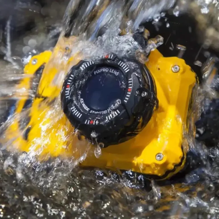 Hiker using Kodak PIXPRO WPZ2 to photograph waterfall in rainy conditions